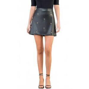NEW MINT EXCLUSIVES millie bow charm vegan leather skirt in black